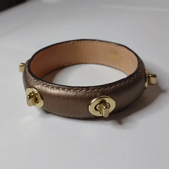 7.75 Inch Coach Turnlock Bangle - Picture 1 of 11
